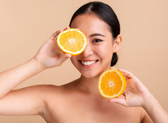 Close-up asian girl with orange