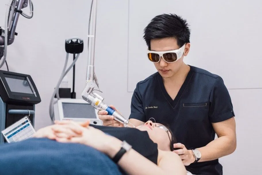 Doctor during Acne Scar Treatment