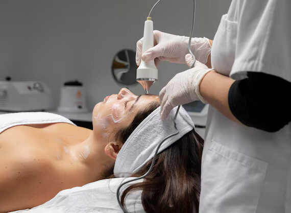 Young woman having a facial treatment